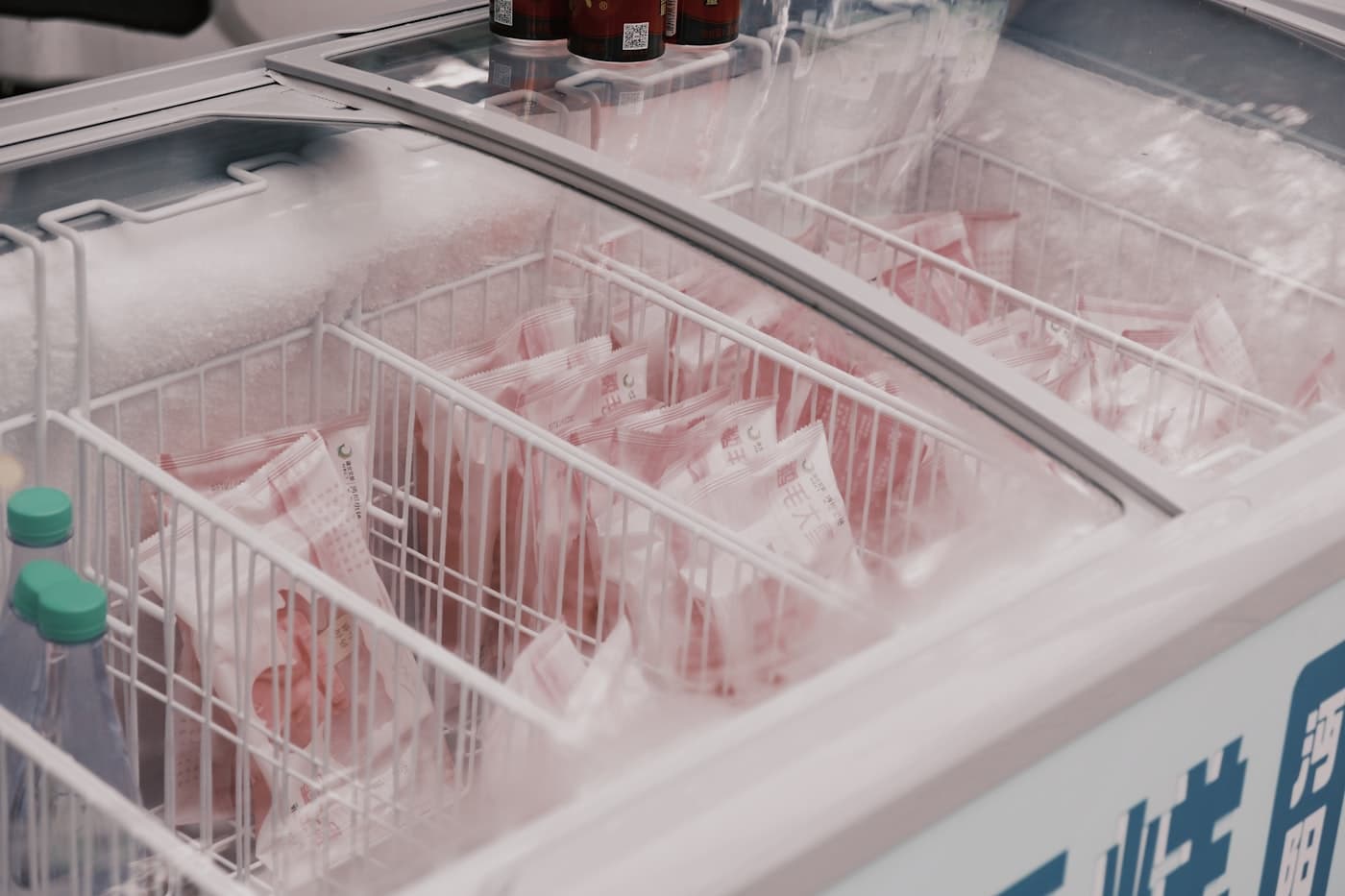 Commercial deep freezer with frost buildup